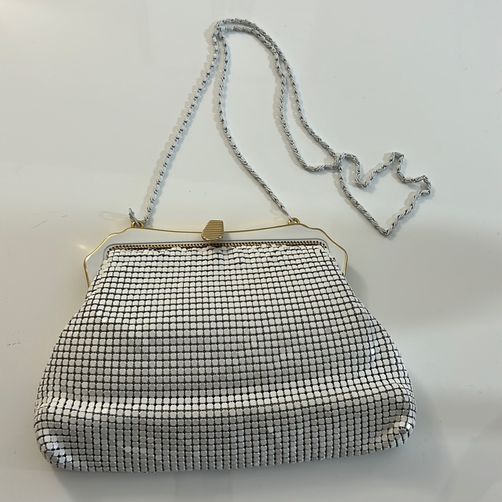 Beautiful white purse in lightweight white dust bag